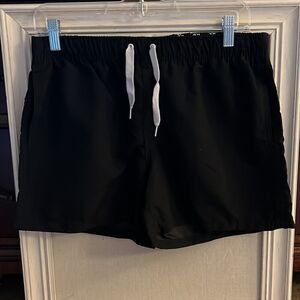 Black swim trunks w elastic waist and side pockets NWT L